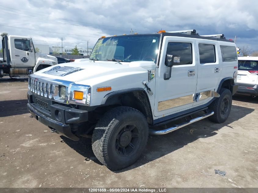 2004 Hummer H2 VIN: 5GRGN23UX4H121327 Lot: 12001859