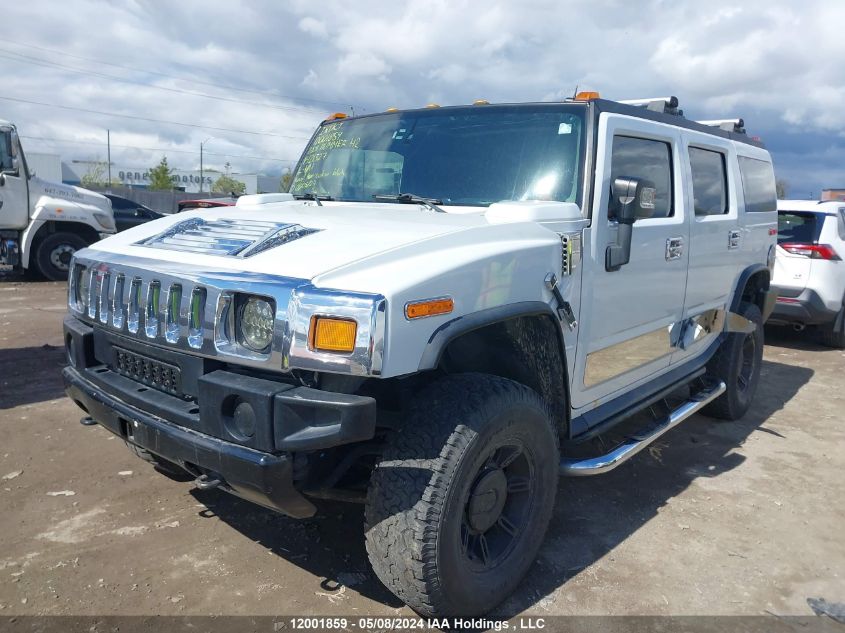 2004 Hummer H2 VIN: 5GRGN23UX4H121327 Lot: 12001859
