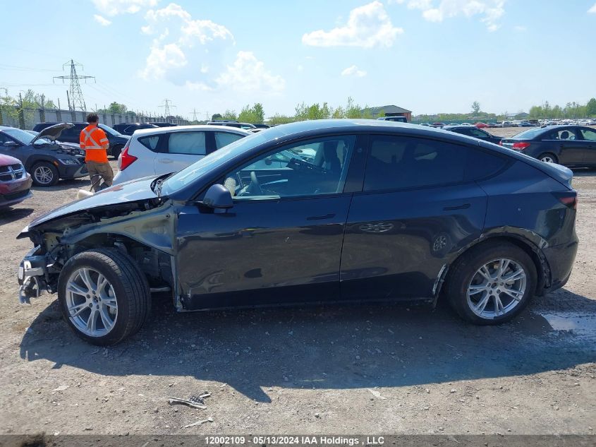 2024 Tesla Model Y VIN: 7SAYGDEE9RF994174 Lot: 12002109