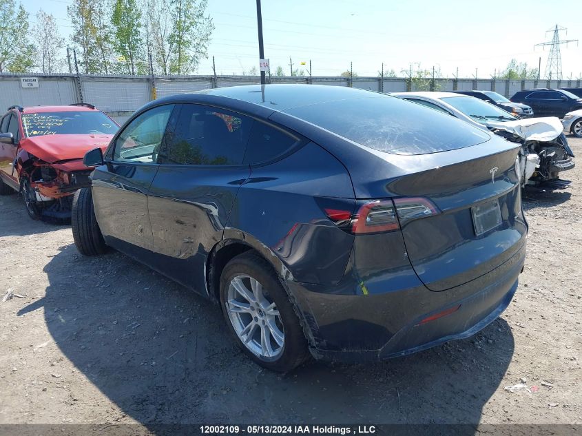 2024 Tesla Model Y VIN: 7SAYGDEE9RF994174 Lot: 12002109