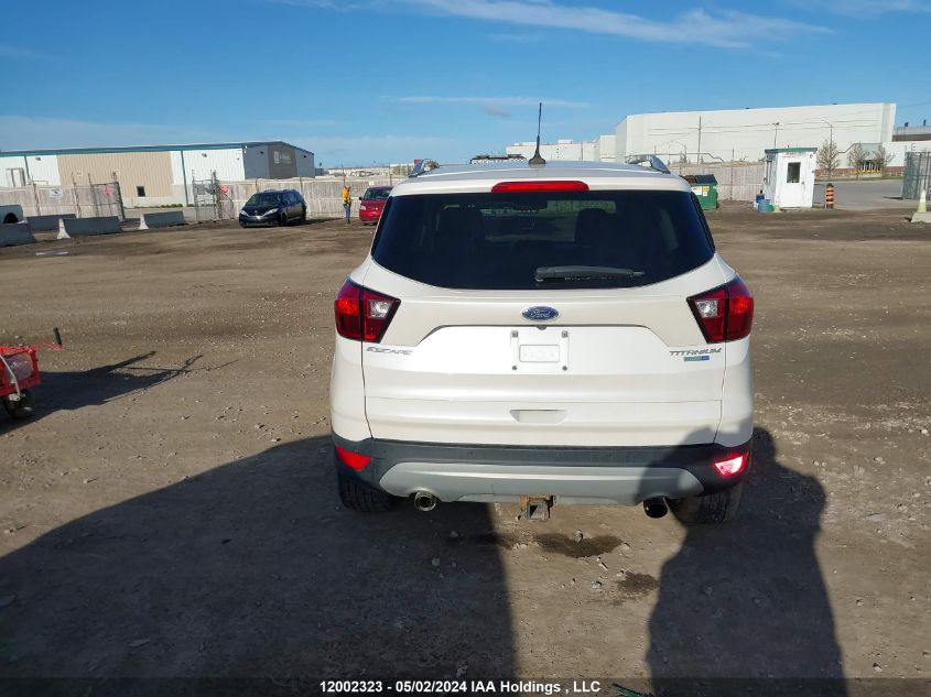 2019 Ford Escape Titanium VIN: 1FMCU9J94KUB87396 Lot: 12002323