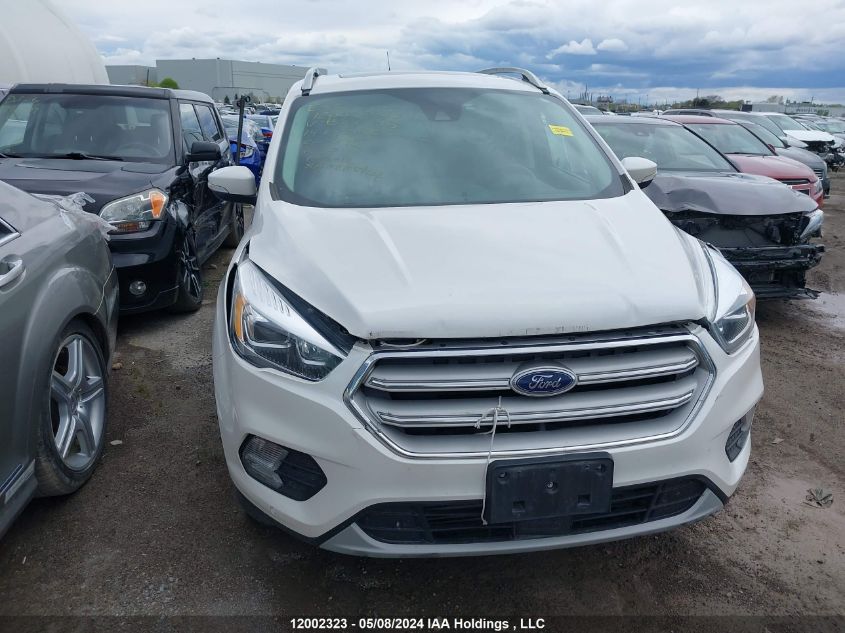 2019 Ford Escape Titanium VIN: 1FMCU9J94KUB87396 Lot: 12002323