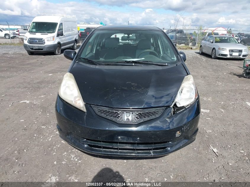 2009 Honda Fit VIN: JHMGE88509S811957 Lot: 12002337