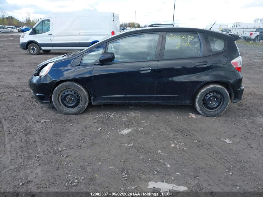 2009 Honda Fit VIN: JHMGE88509S811957 Lot: 12002337