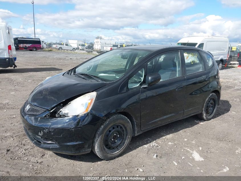 2009 Honda Fit VIN: JHMGE88509S811957 Lot: 12002337