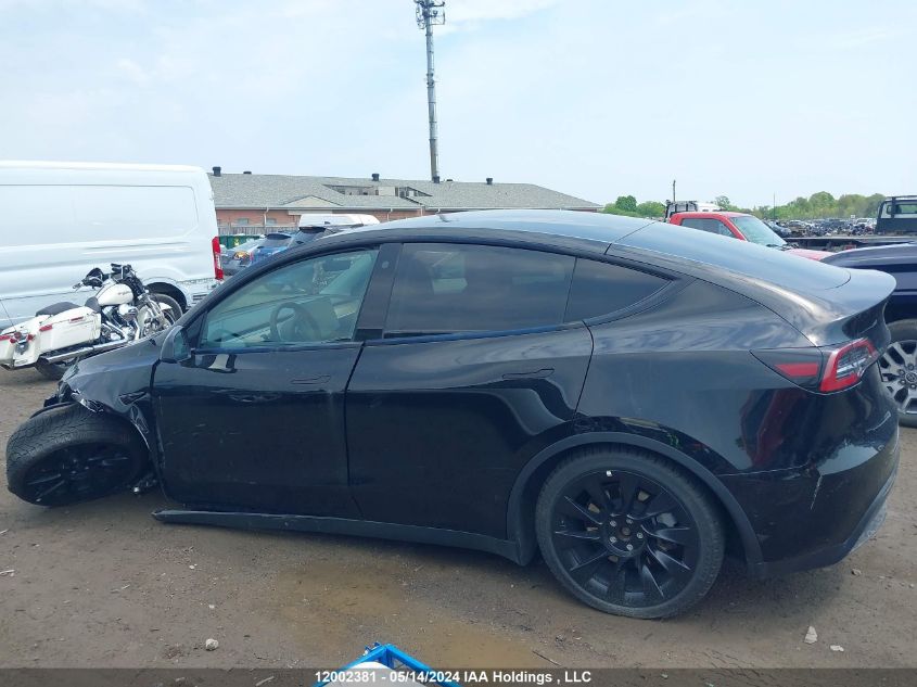 2022 Tesla Model Y VIN: 7SAYGDEE6NF573202 Lot: 12002381