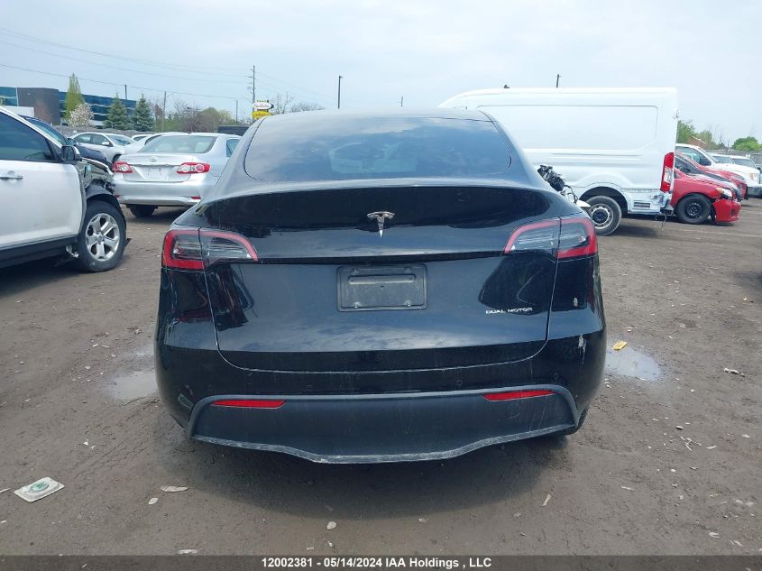 2022 Tesla Model Y VIN: 7SAYGDEE6NF573202 Lot: 12002381