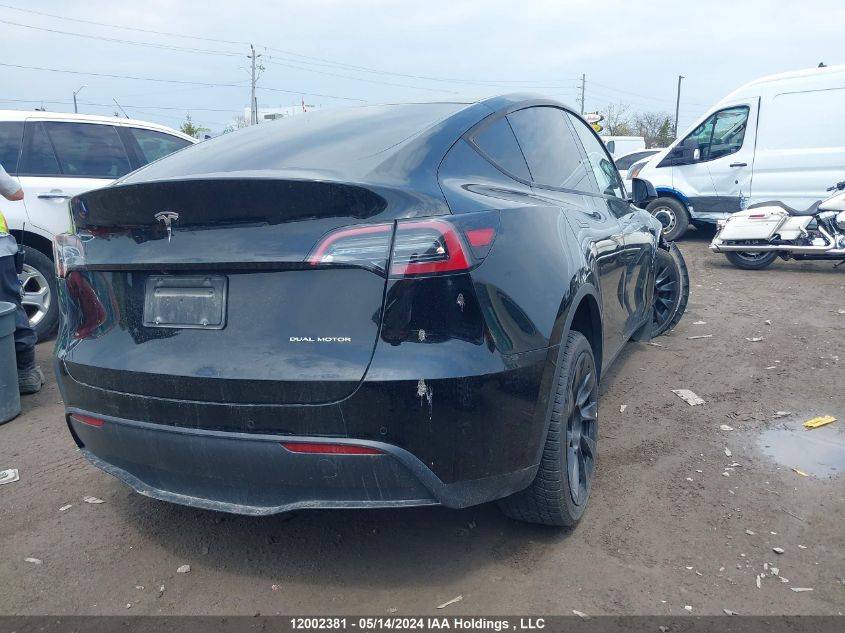 2022 Tesla Model Y VIN: 7SAYGDEE6NF573202 Lot: 12002381