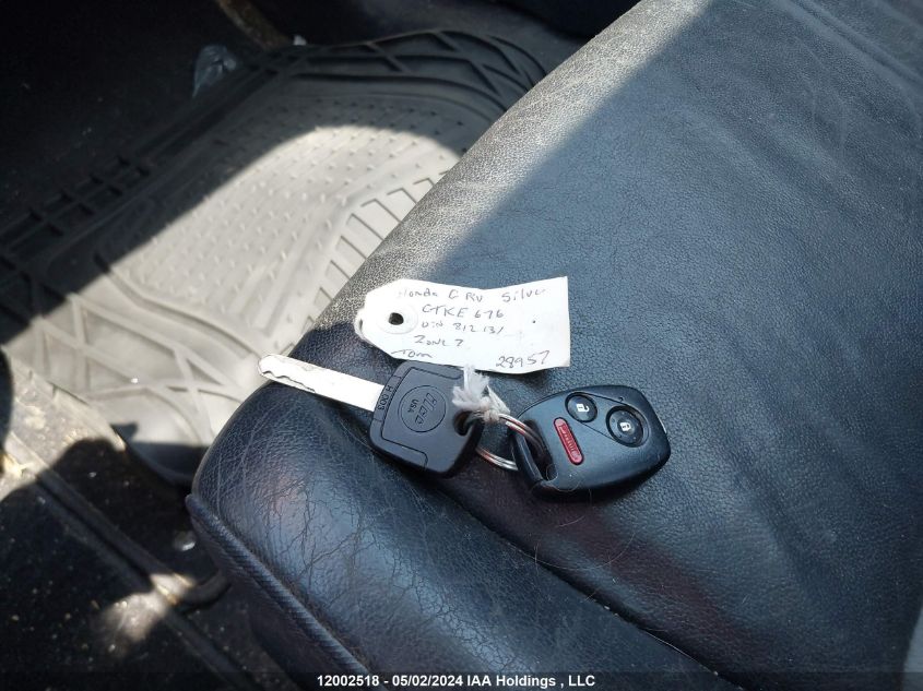 2009 Honda Cr-V Exl VIN: 5J6RE48799L812131 Lot: 12002518