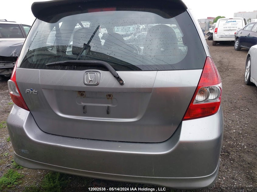 2007 Honda Fit VIN: JHMGD38697S810012 Lot: 12002538