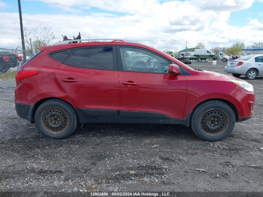 2011 Hyundai Tucson VIN: KM8JU3AC0BU314094 Lot: 12002650