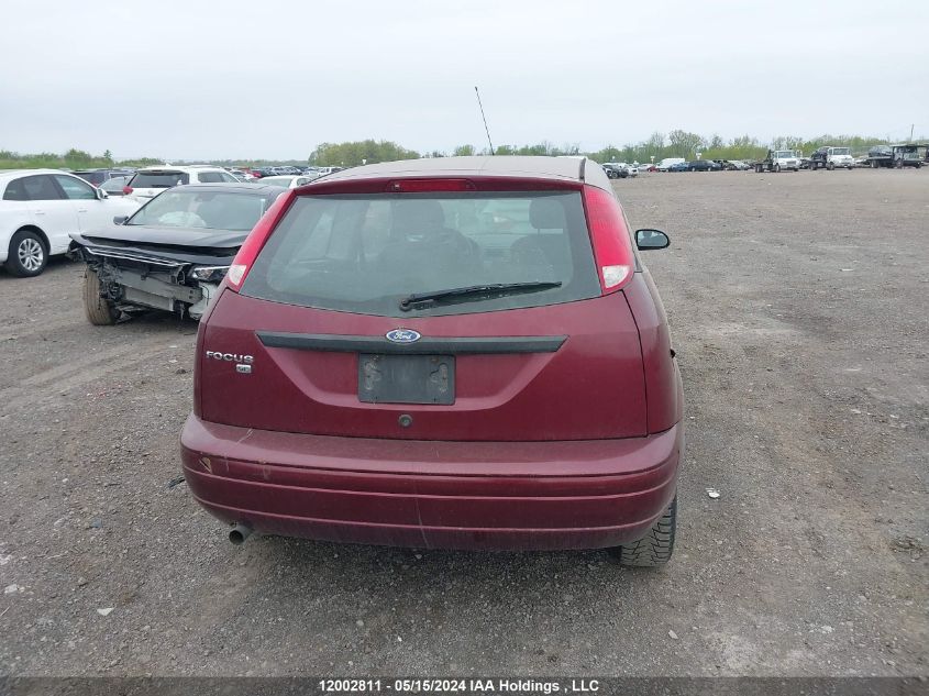 2007 Ford Focus VIN: 1FAFP31N27W337266 Lot: 12002811