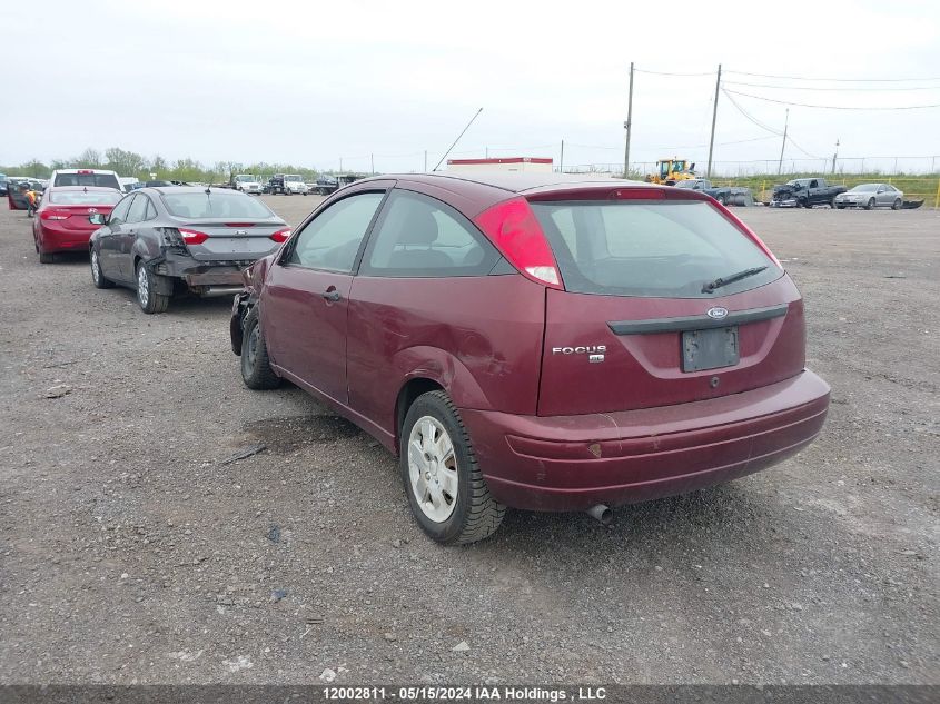 2007 Ford Focus VIN: 1FAFP31N27W337266 Lot: 12002811