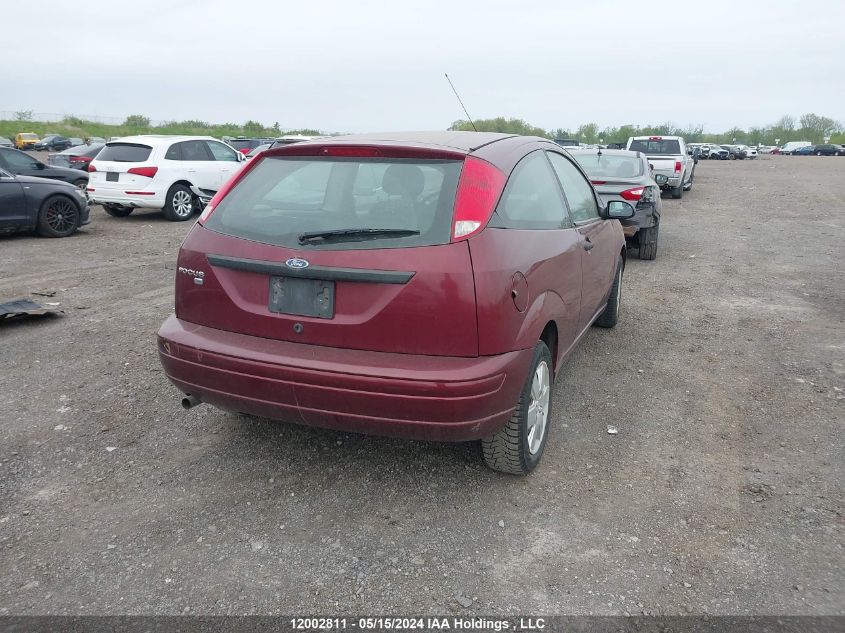 2007 Ford Focus VIN: 1FAFP31N27W337266 Lot: 12002811