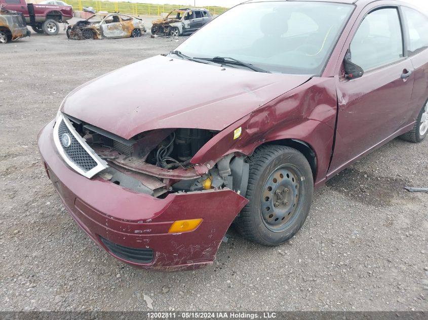 2007 Ford Focus VIN: 1FAFP31N27W337266 Lot: 12002811