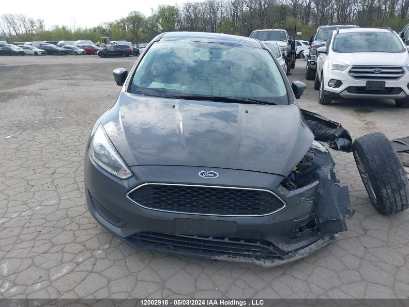 2015 Ford Focus Se VIN: 1FADP3F27FL320369 Lot: 12002918