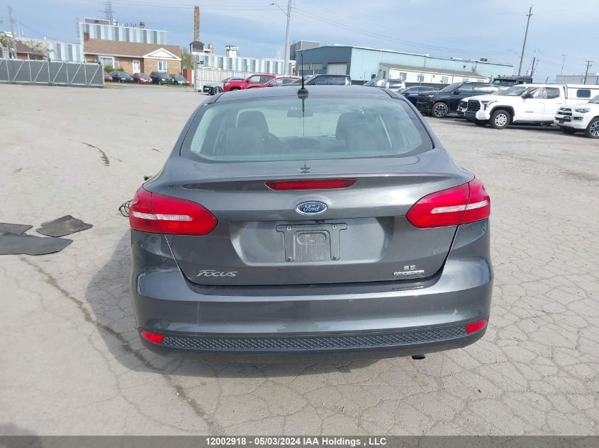 2015 Ford Focus Se VIN: 1FADP3F27FL320369 Lot: 12002918