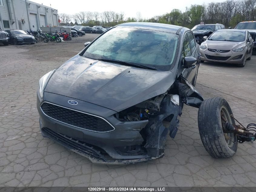 2015 Ford Focus Se VIN: 1FADP3F27FL320369 Lot: 12002918