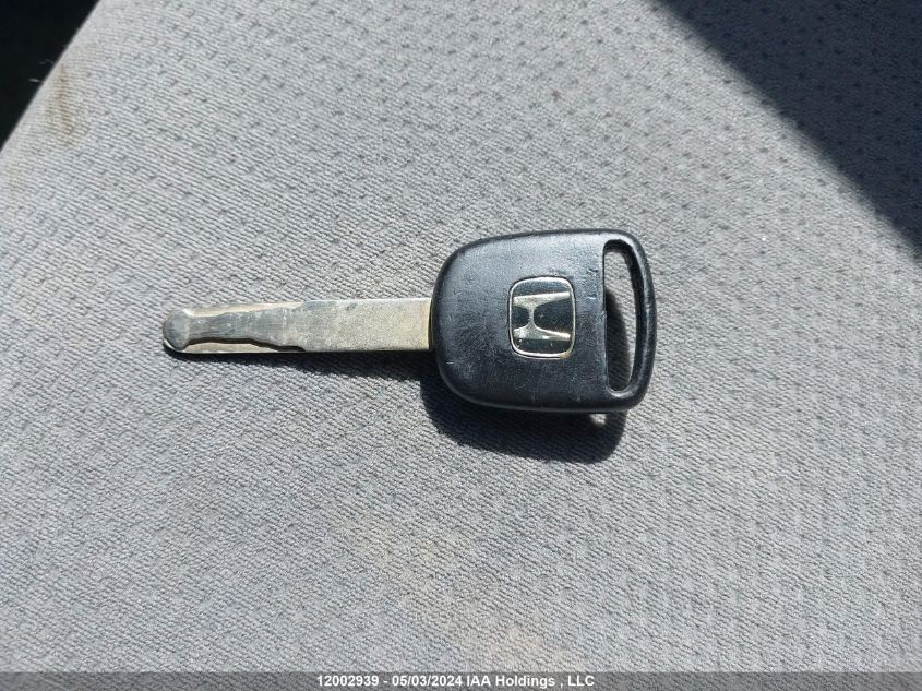 2009 Honda Civic Dx VIN: 2HGFG12259H001133 Lot: 12002939