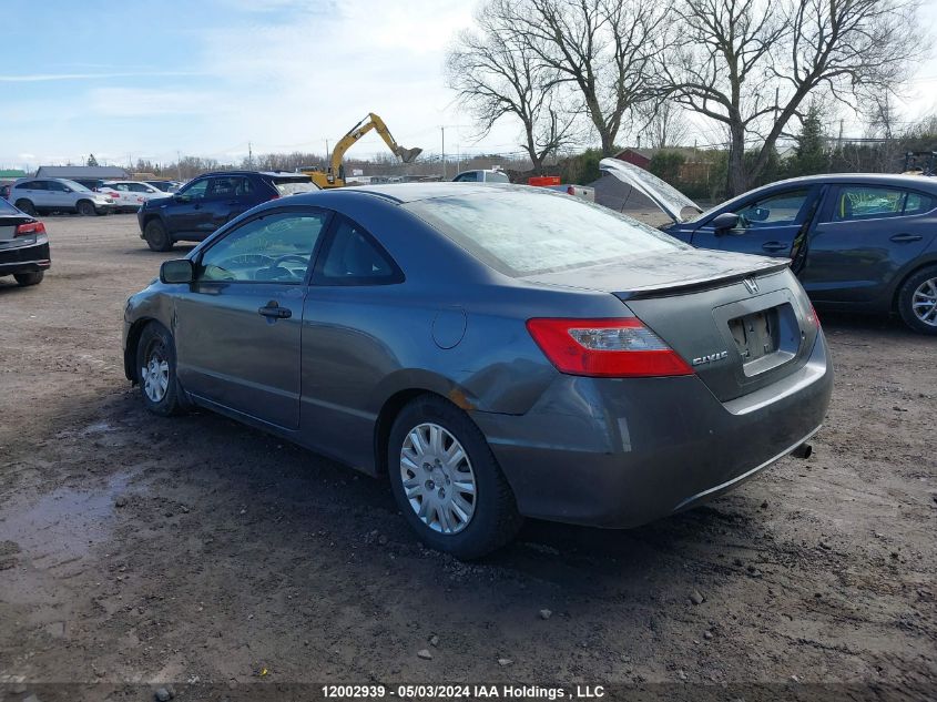 2009 Honda Civic Dx VIN: 2HGFG12259H001133 Lot: 12002939