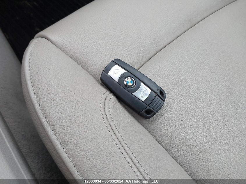 2011 BMW 1 Series VIN: WBAUC9C52BVM10113 Lot: 12003034