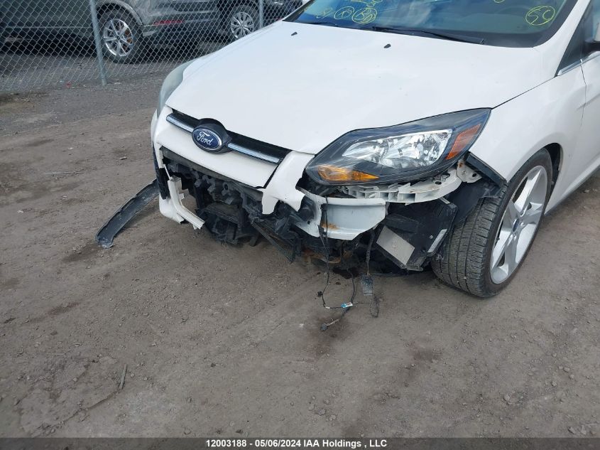 2014 Ford Focus Titanium VIN: 1FADP3N23EL358228 Lot: 12003188