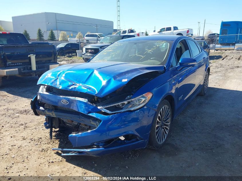 2017 Ford Fusion Energi Se Luxury VIN: 3FA6P0PU9HR127880 Lot: 12003294