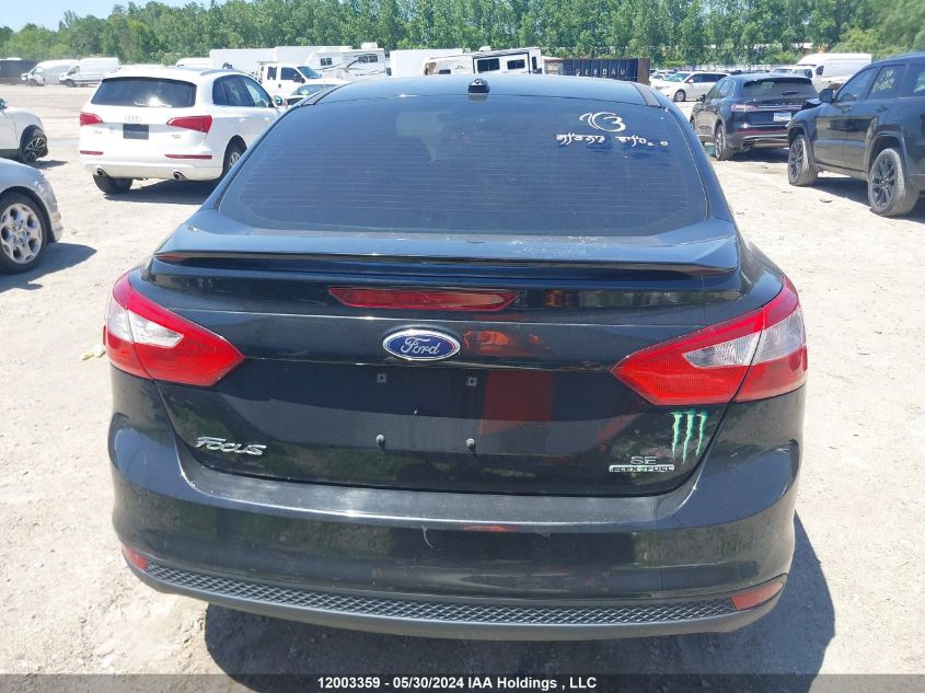 2014 Ford Focus Se VIN: 1FADP3F21EL335352 Lot: 12003359