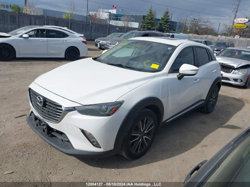 2016 Mazda Cx-3 Grand Touring VIN: JM1DKFD7XG0128696 Lot: 12004127