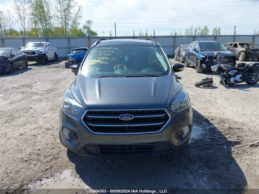 2017 Ford Escape Titanium VIN: 1FMCU0J9XHUA41847 Lot: 12004303