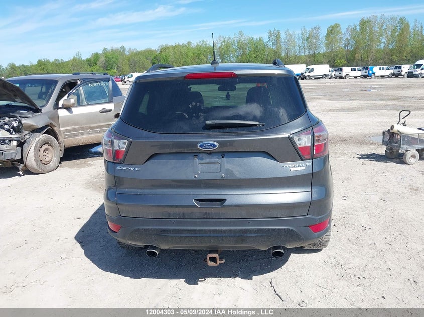 2017 Ford Escape Titanium VIN: 1FMCU0J9XHUA41847 Lot: 12004303
