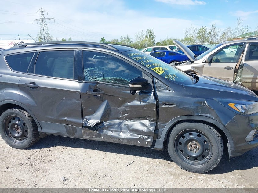 2017 Ford Escape Titanium VIN: 1FMCU0J9XHUA41847 Lot: 12004303