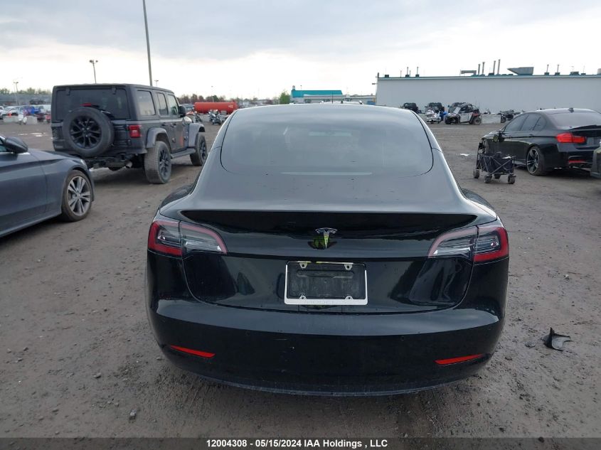 2021 Tesla Model 3 VIN: 5YJ3E1EA9MF086048 Lot: 12004308