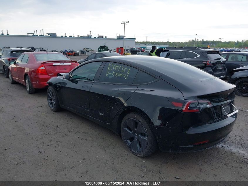 2021 Tesla Model 3 VIN: 5YJ3E1EA9MF086048 Lot: 12004308