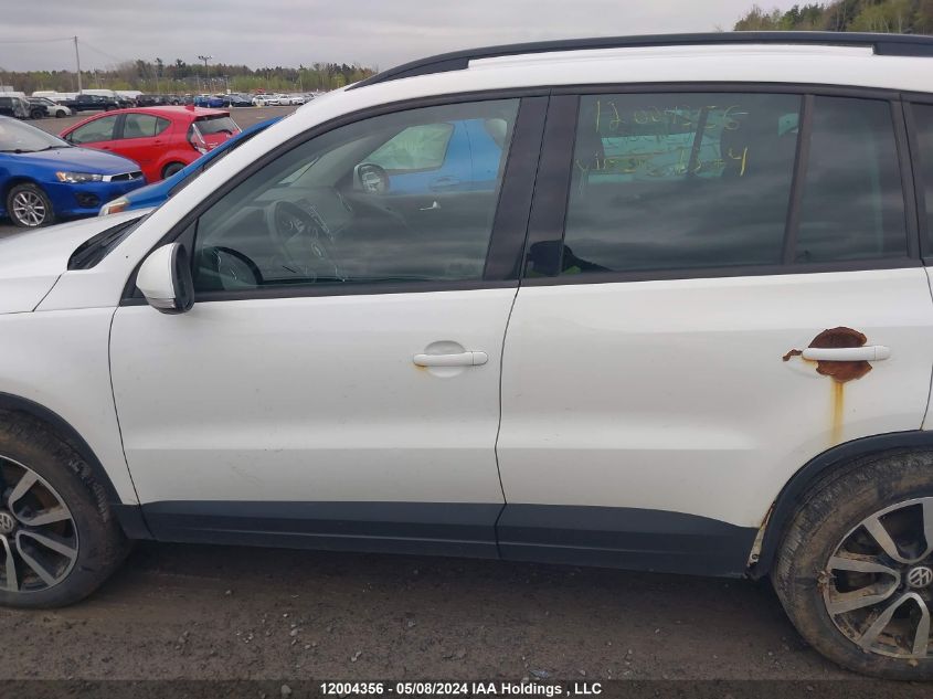 2014 Volkswagen Tiguan VIN: WVGJV3AX5EW567324 Lot: 12004356