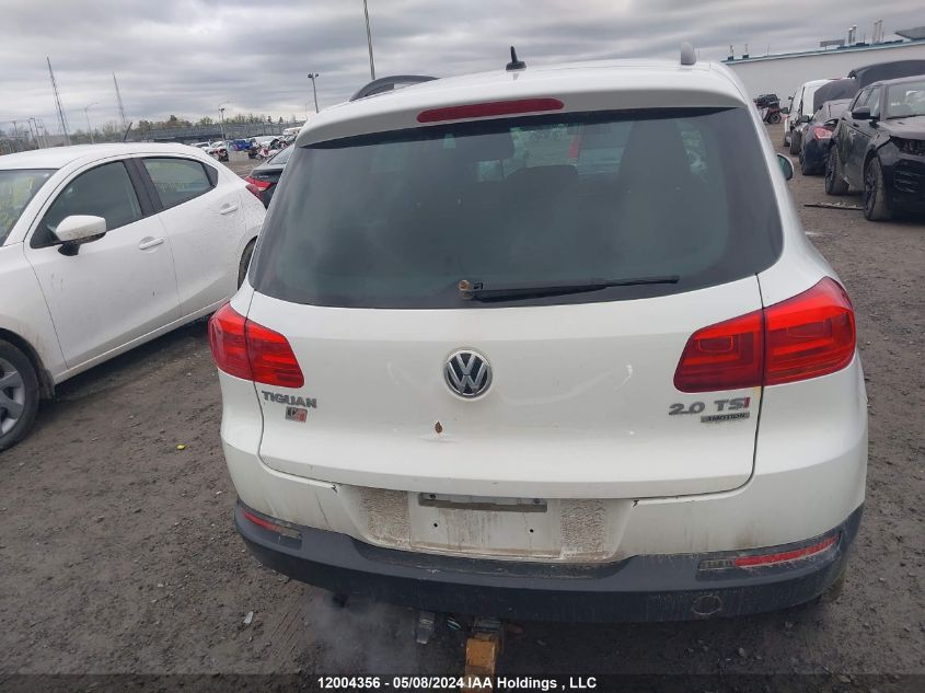 2014 Volkswagen Tiguan VIN: WVGJV3AX5EW567324 Lot: 12004356