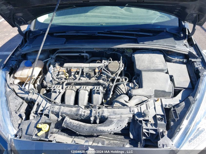 2015 Ford Focus S VIN: 1FADP3E28FL371252 Lot: 12004828