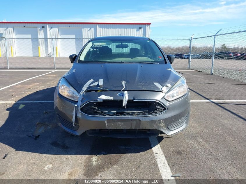 2015 Ford Focus S VIN: 1FADP3E28FL371252 Lot: 12004828