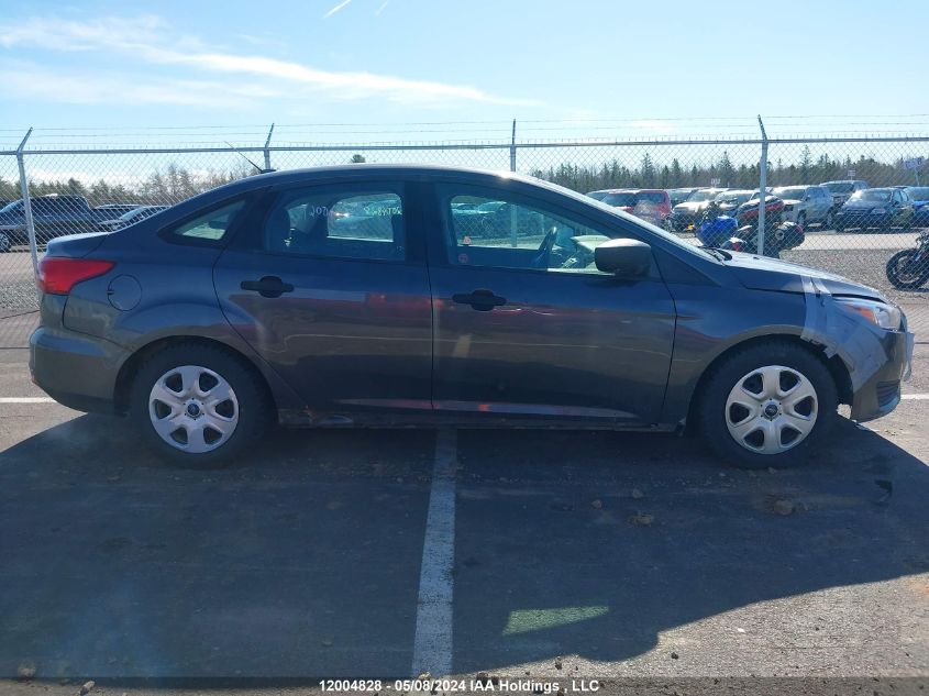 2015 Ford Focus S VIN: 1FADP3E28FL371252 Lot: 12004828