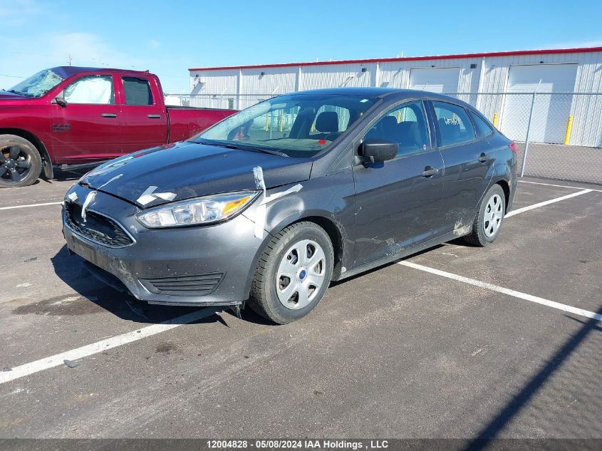 2015 Ford Focus S VIN: 1FADP3E28FL371252 Lot: 12004828