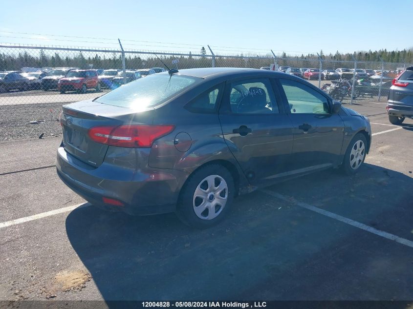 2015 Ford Focus S VIN: 1FADP3E28FL371252 Lot: 12004828