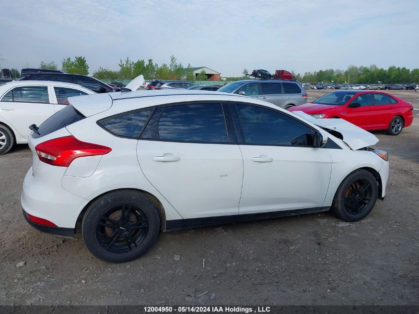 2017 Ford Focus Se VIN: 1FADP3K20HL310694 Lot: 12004950