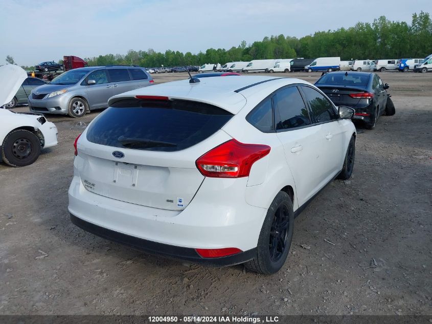 2017 Ford Focus Se VIN: 1FADP3K20HL310694 Lot: 12004950