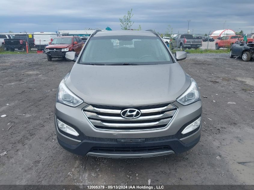 2014 Hyundai Santa Fe Sport 2.4 Premium VIN: 5XYZUDLBXEG205312 Lot: 12005379