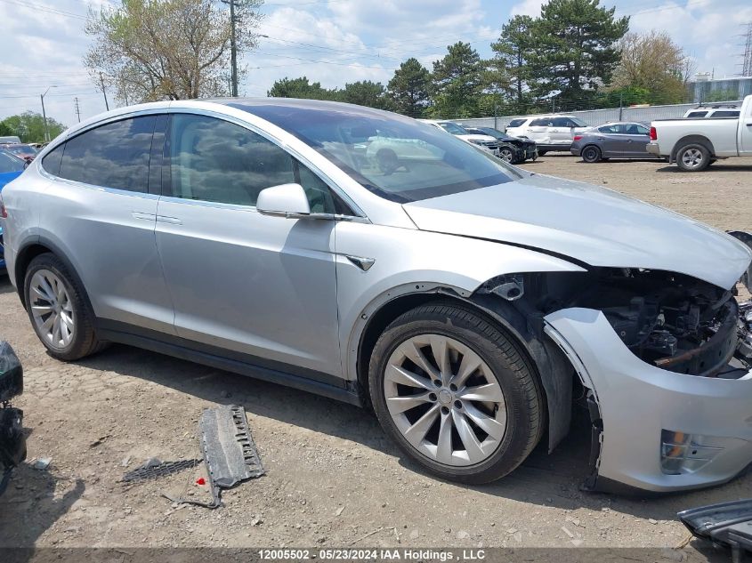 2018 Tesla Model X 100D/75D/P100D VIN: 5YJXCDE2XJF099811 Lot: 12005502