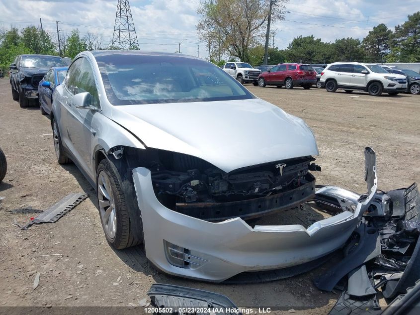 2018 Tesla Model X 100D/75D/P100D VIN: 5YJXCDE2XJF099811 Lot: 12005502