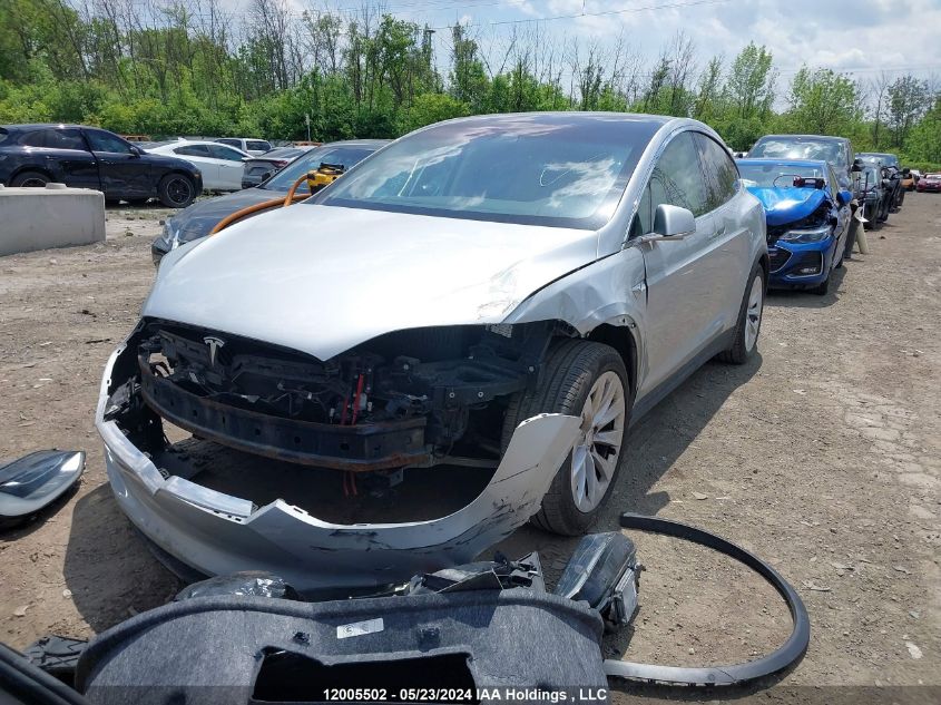 2018 Tesla Model X 100D/75D/P100D VIN: 5YJXCDE2XJF099811 Lot: 12005502