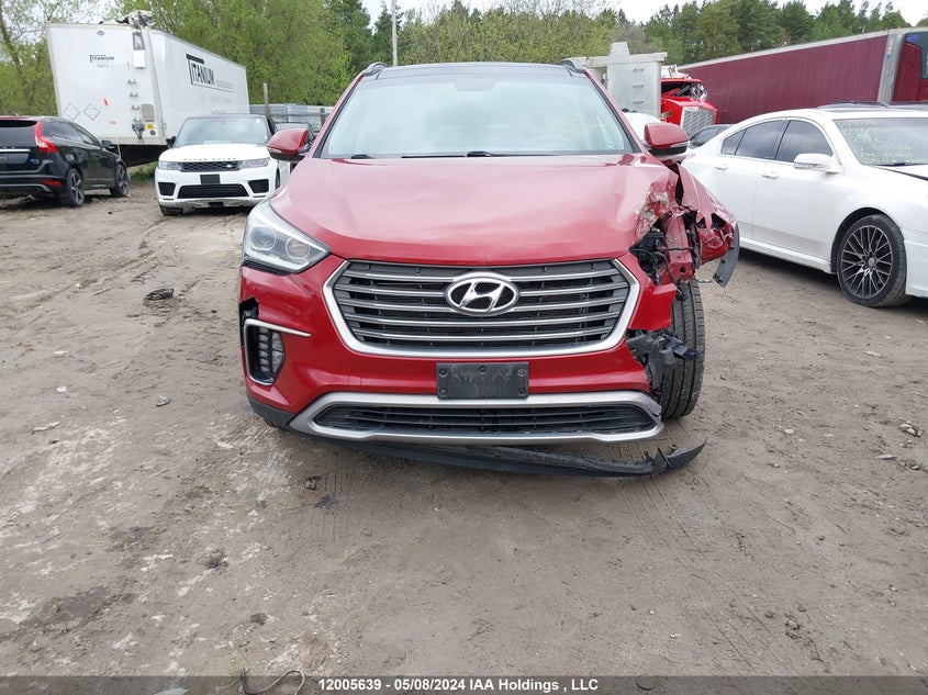 2017 Hyundai Santa Fe Se/Limited VIN: KM8SNDHF5HU214704 Lot: 12005639