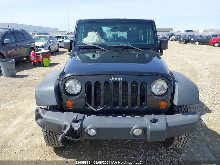 2011 Jeep Wrangler Sport VIN: 1J4AA2D11BL613384 Lot: 12005689