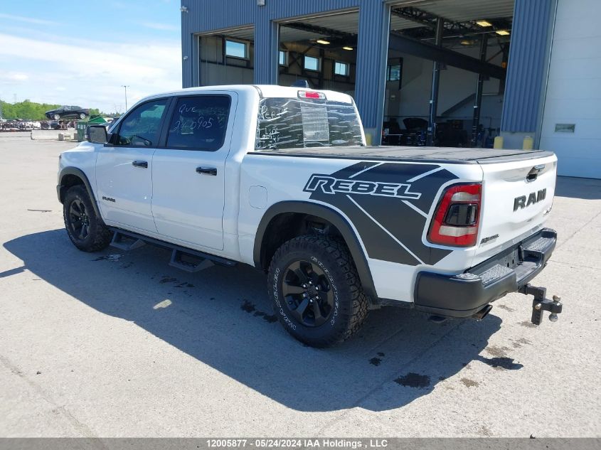 2023 Ram 1500 Rebel VIN: 1C6SRFLTXPN667878 Lot: 12005877